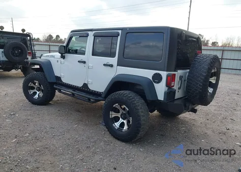2011 Jeep Wrangler Unlimited Rubicon из США, поврежденный, VIN 1J4BA6H10BL536027